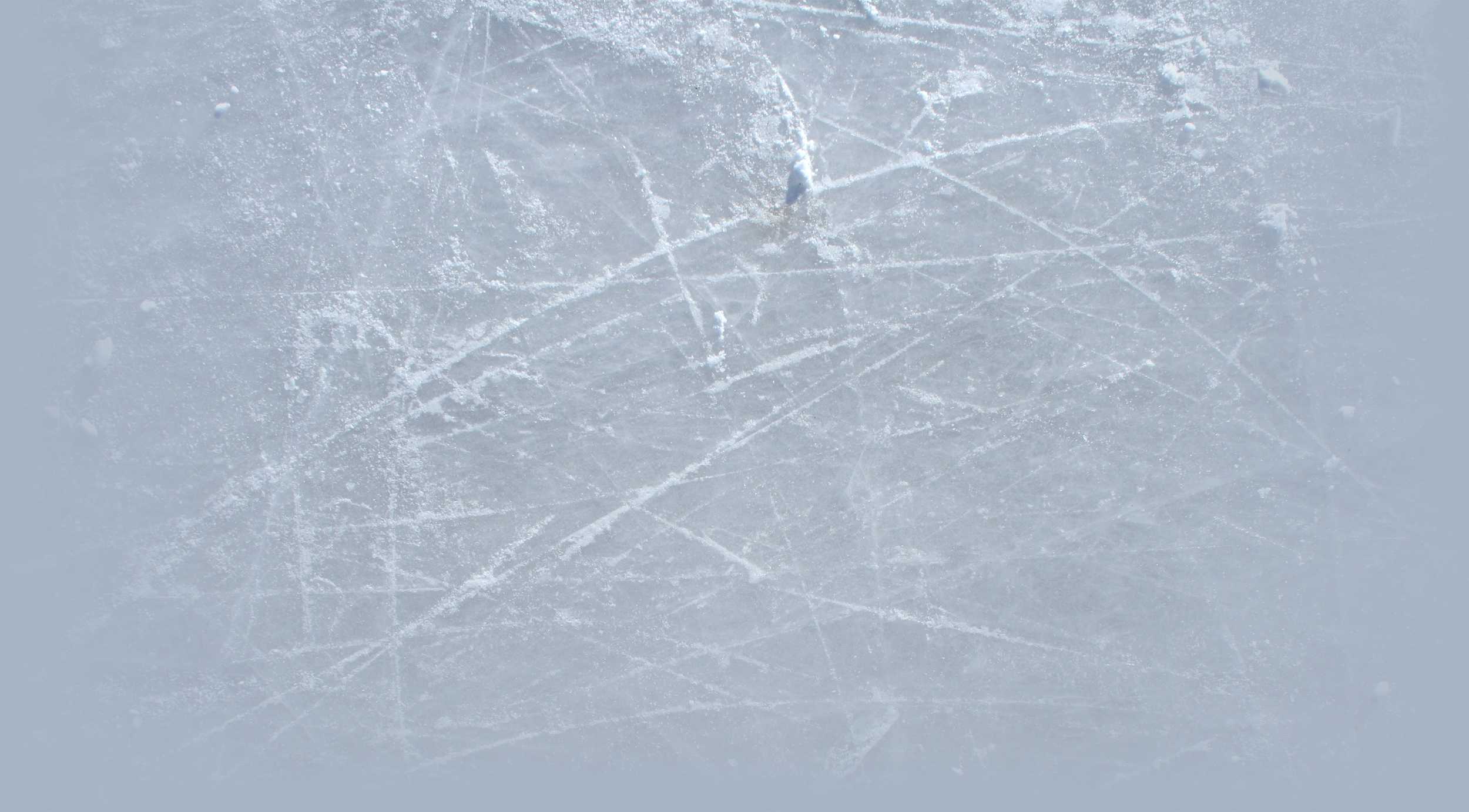 Close-up carved relief print of scratched ice in pale blue-white tones, cold and graphic winter mood